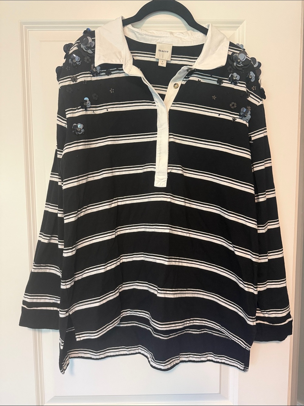 Maeve Black & White Striped Polo with Blue Floral Embellishments